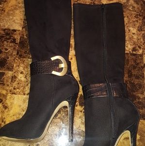 Black suede guess high heel boots.